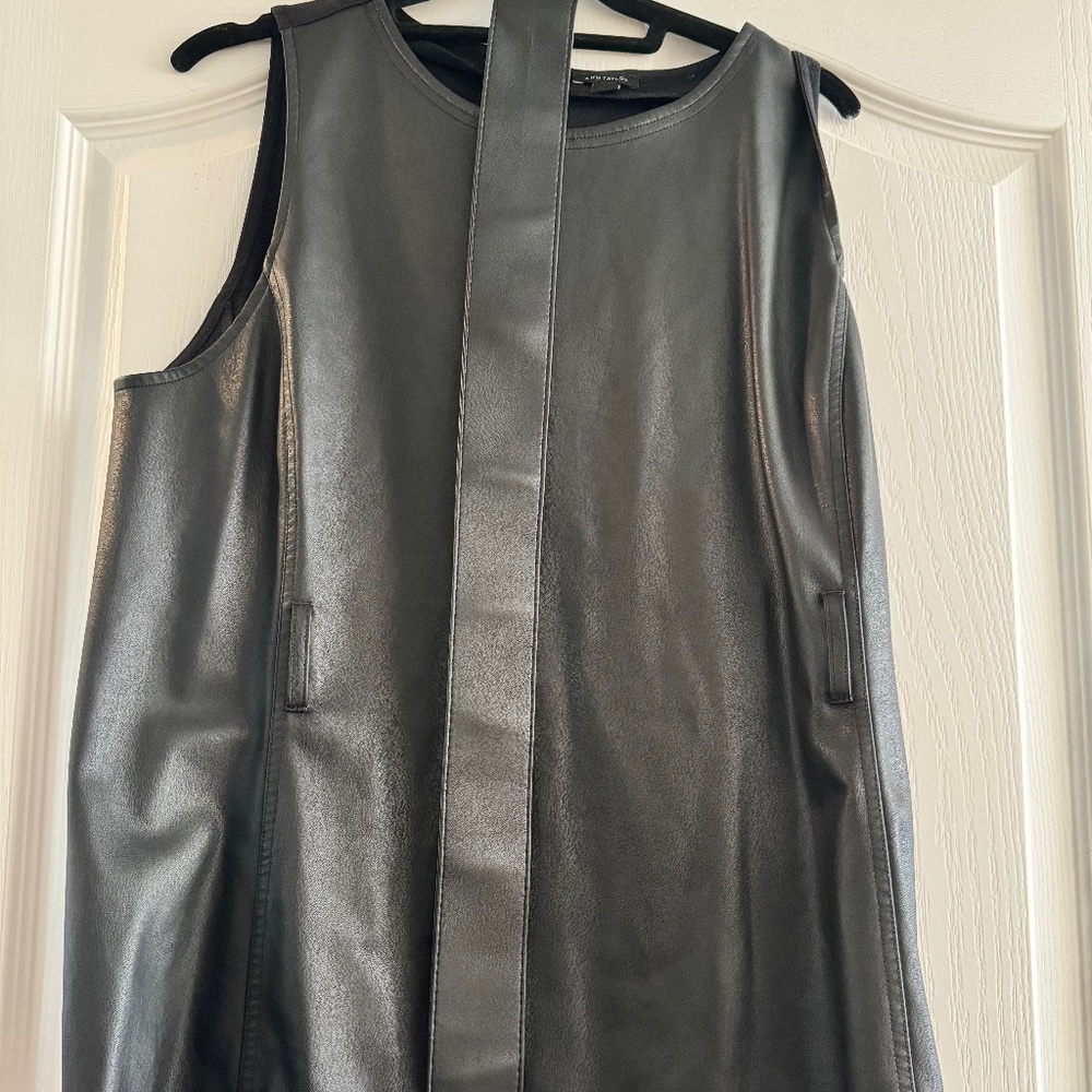 Faux leather sleeveless shirt